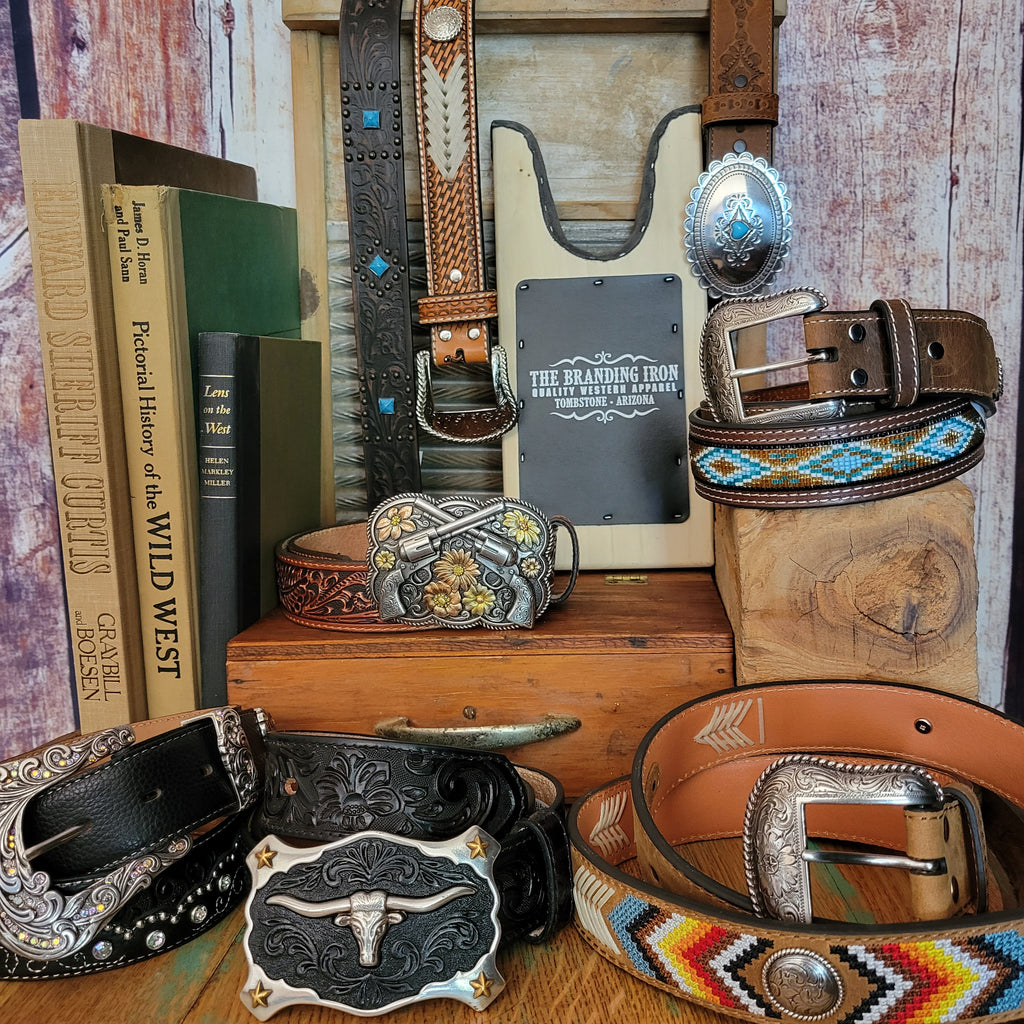 a selection of western leather belts of various styles