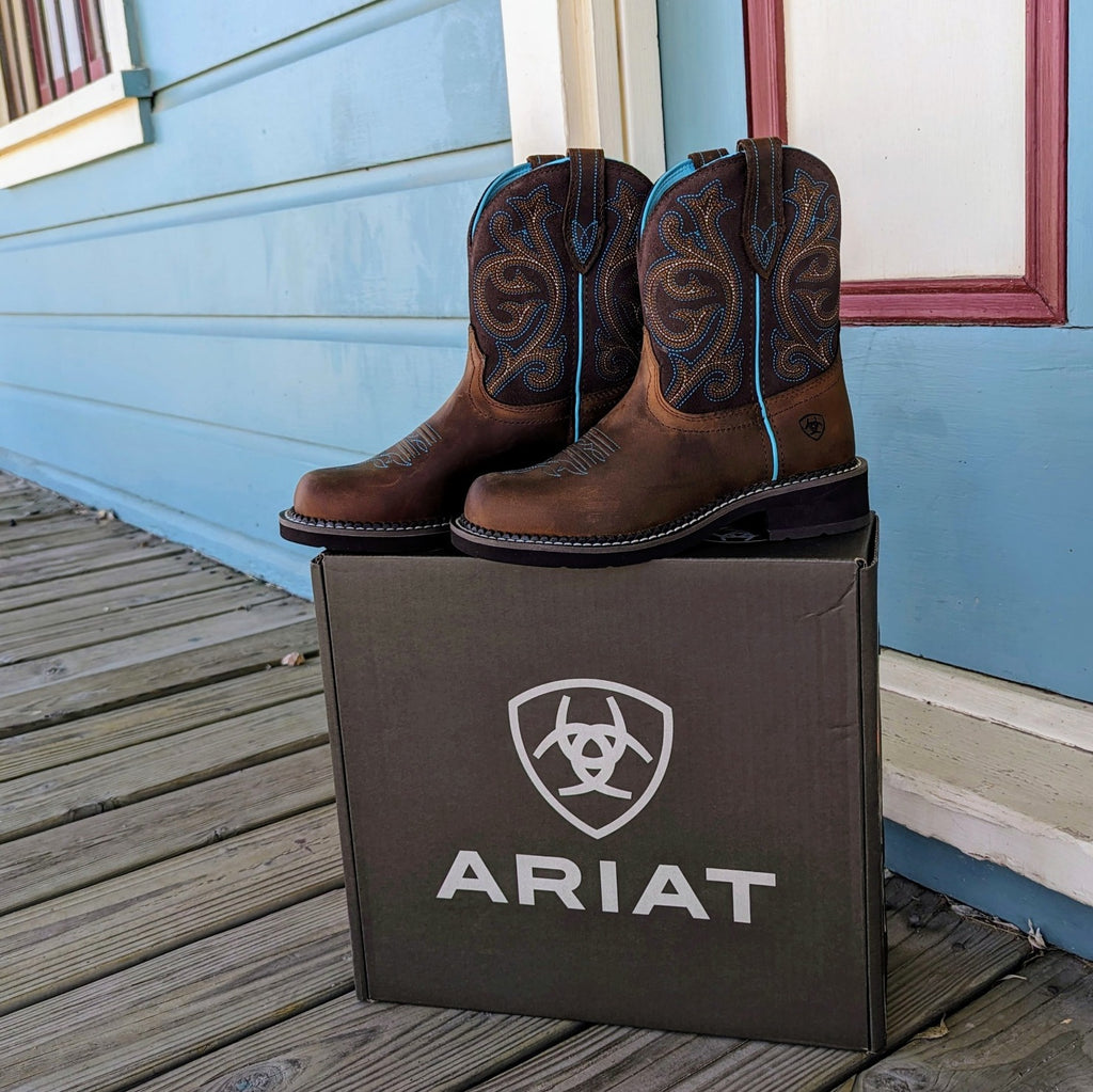 women's fatbaby heritage boots by ariat 100021462 brown boots with turquoise piping and turquoise and yellow stitching