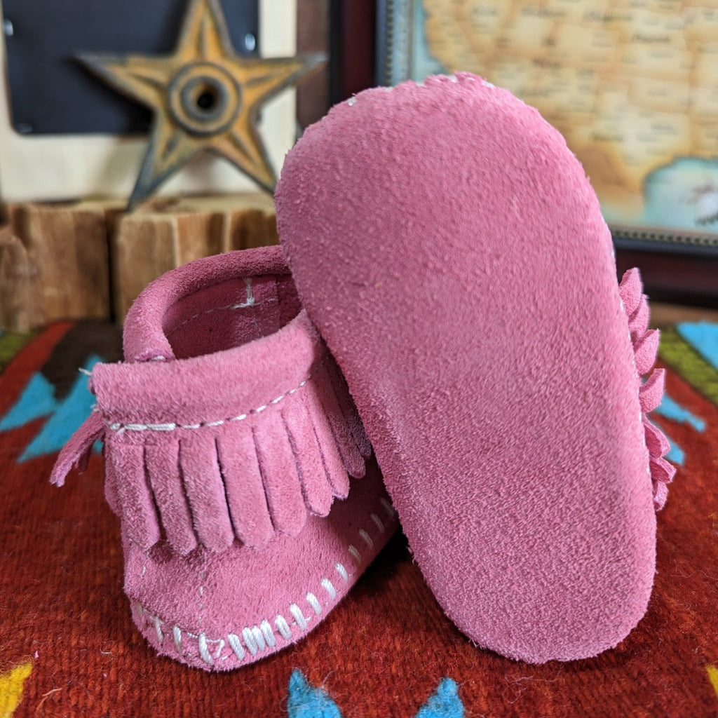 Booties with a "Back Flap" by Minnetonka 1880 pink bottom view