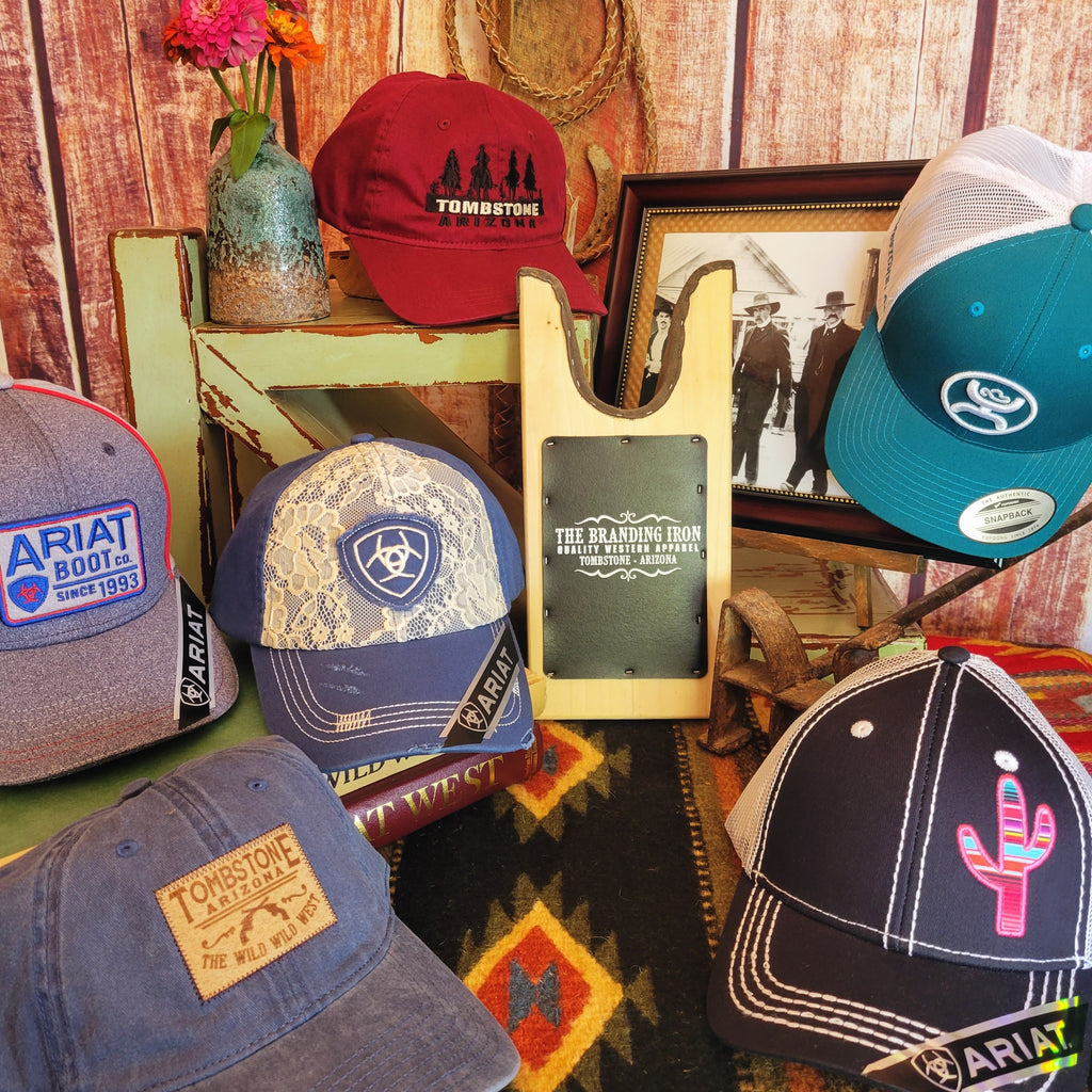 collection of ariat trucker and baseball caps