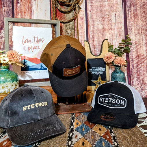 collection of 3 Stetson ball caps of various colors