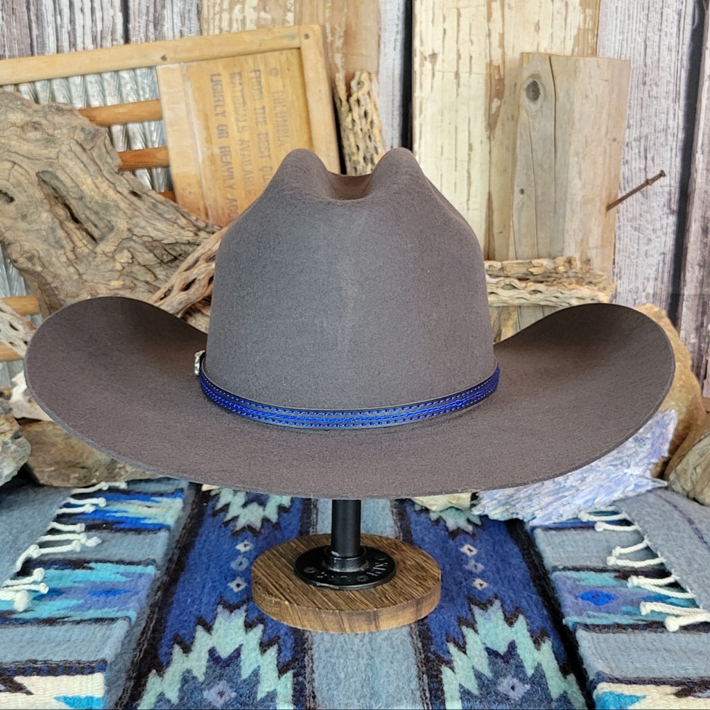 Gray wool felt hat with a smooth blue band.