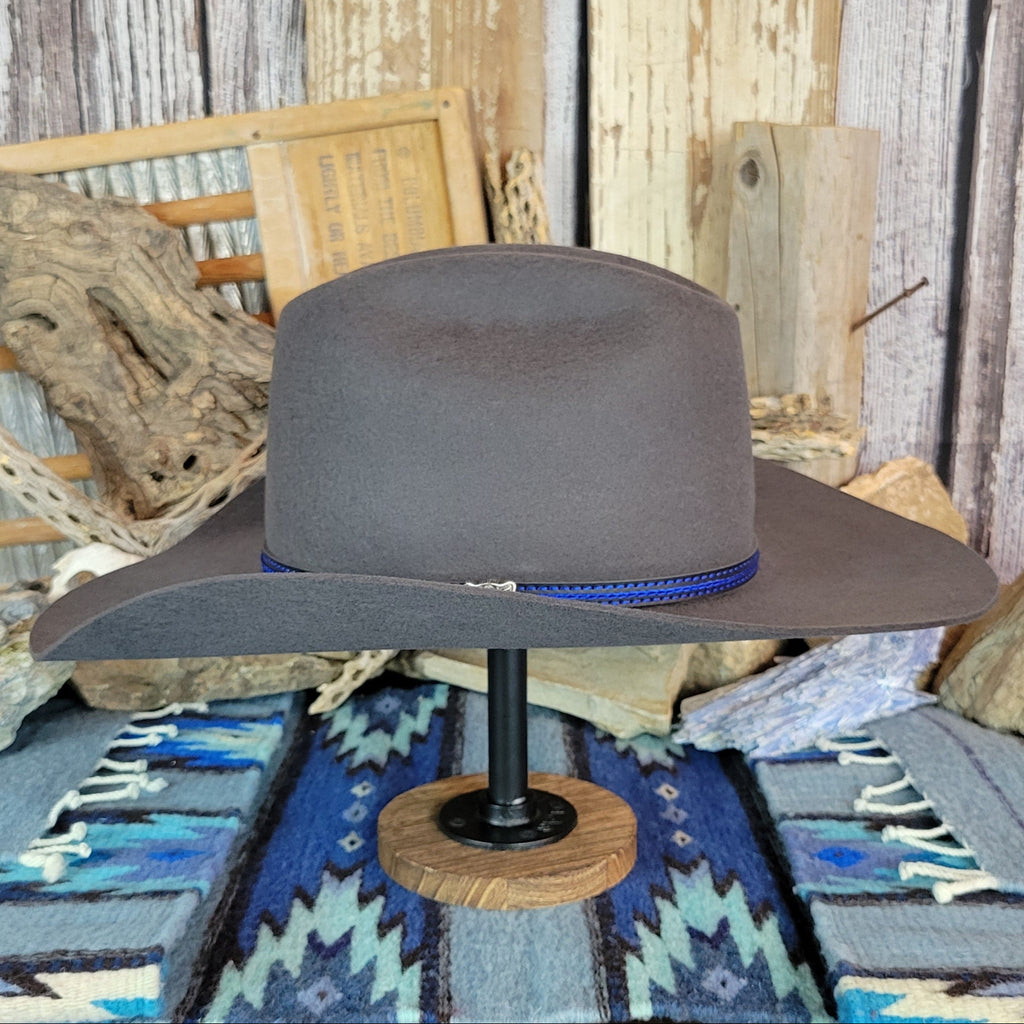 Gray wool felt hat with a blue band.