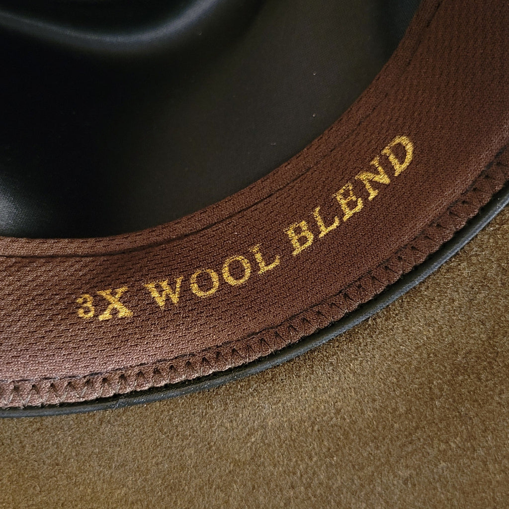 '3X Wool Blend' text on the sweatband in gold letting.