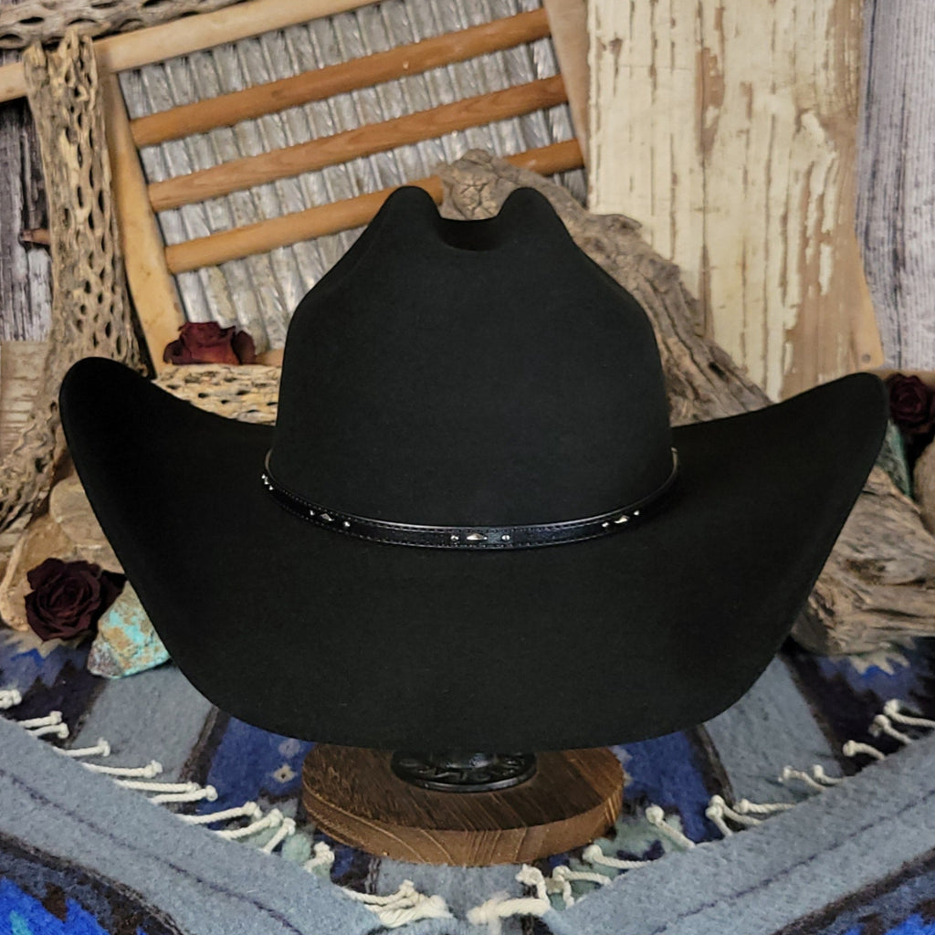 Black cowboy hat featuring a black leather band with silver detailing.