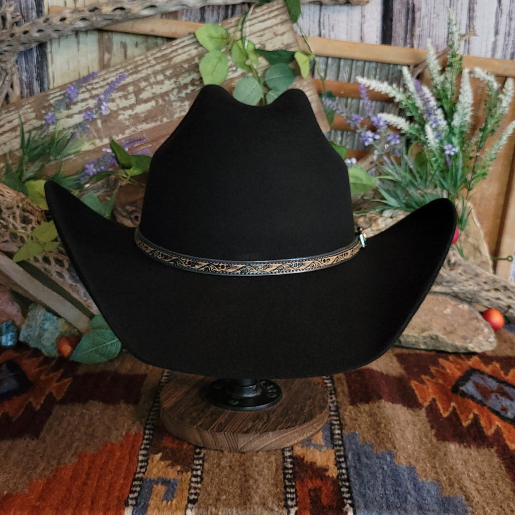 Black, wool cowboy hat with decorative leather hat band.