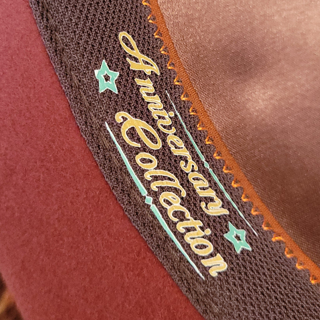 The interior features the "Anniversary Collection" lettering.