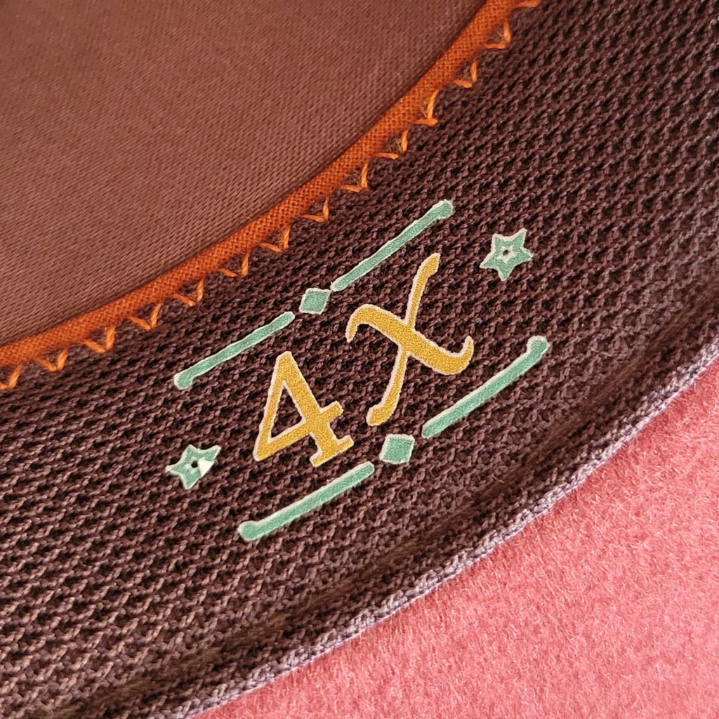 The interior features the "4X" wool lettering.