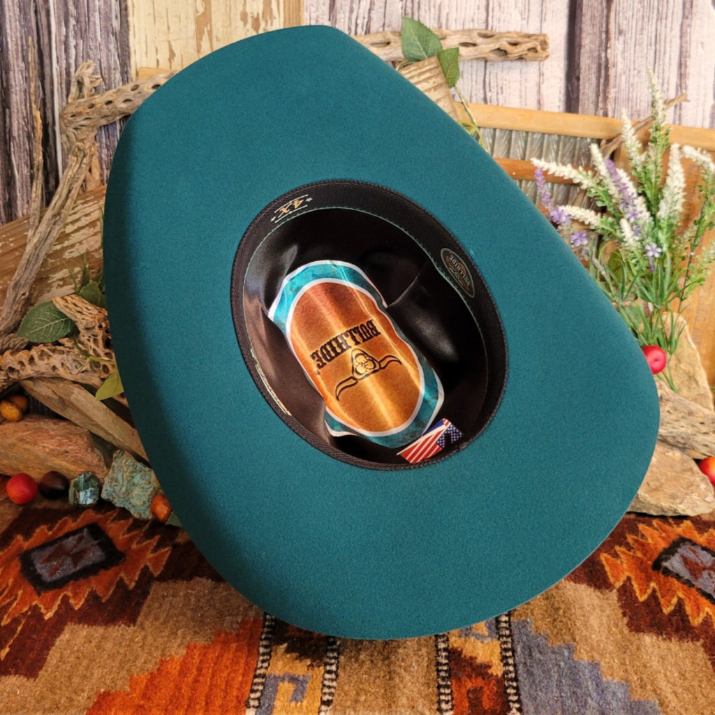 The interior of the hat is satin lined and features the brand's logo.