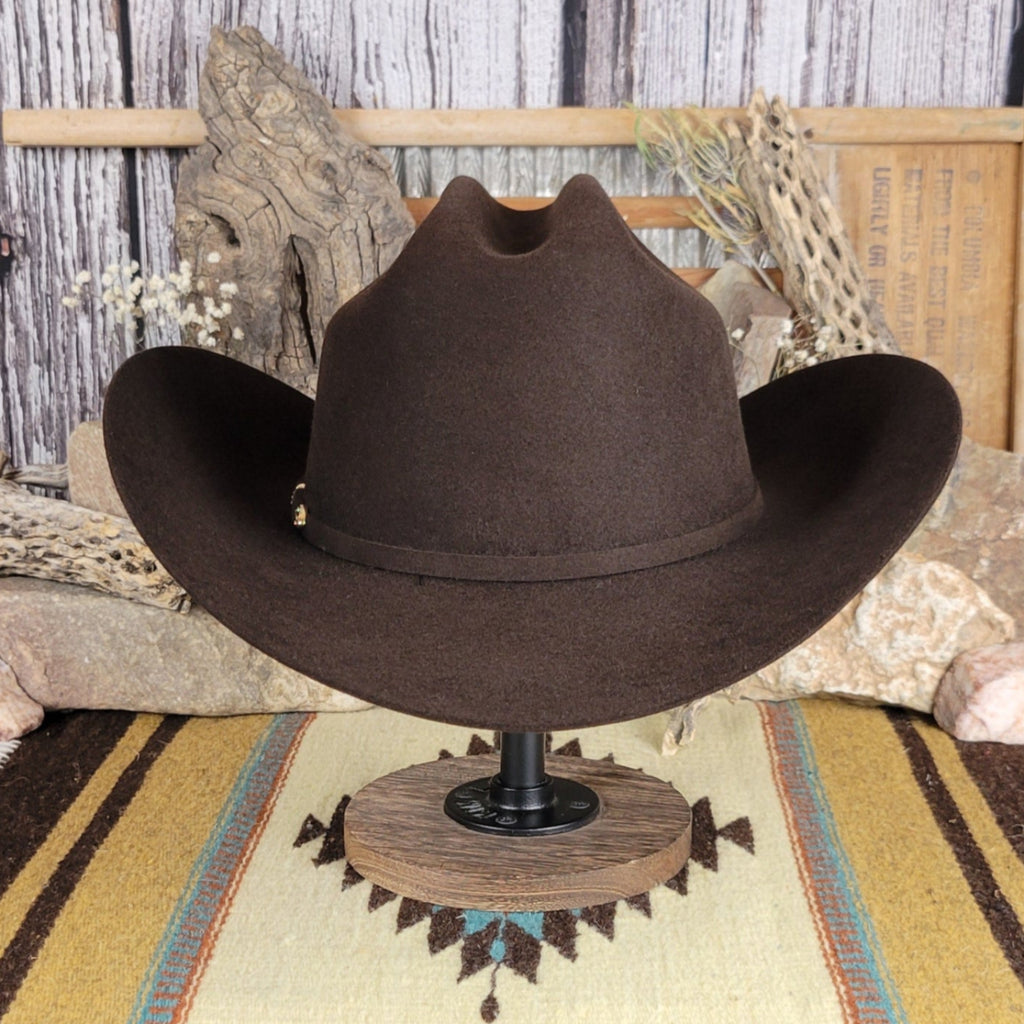 Black fur felt hat with black and mini belt buckle detail on the hat band.