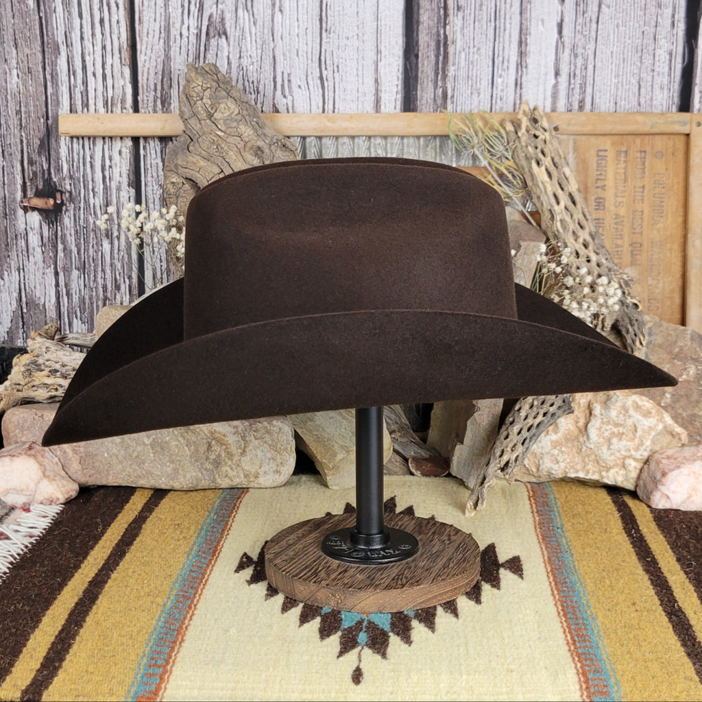 Black fur felt hat with black and mini belt buckle detail on the hat band.