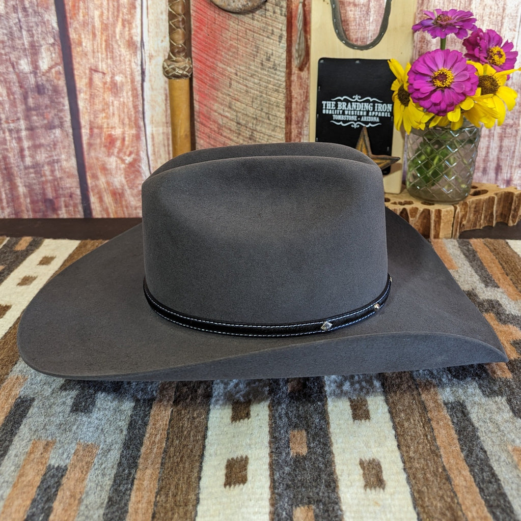 Smooth slate gray side profile with a gently curved brim, accented by the black band’s silver studs.