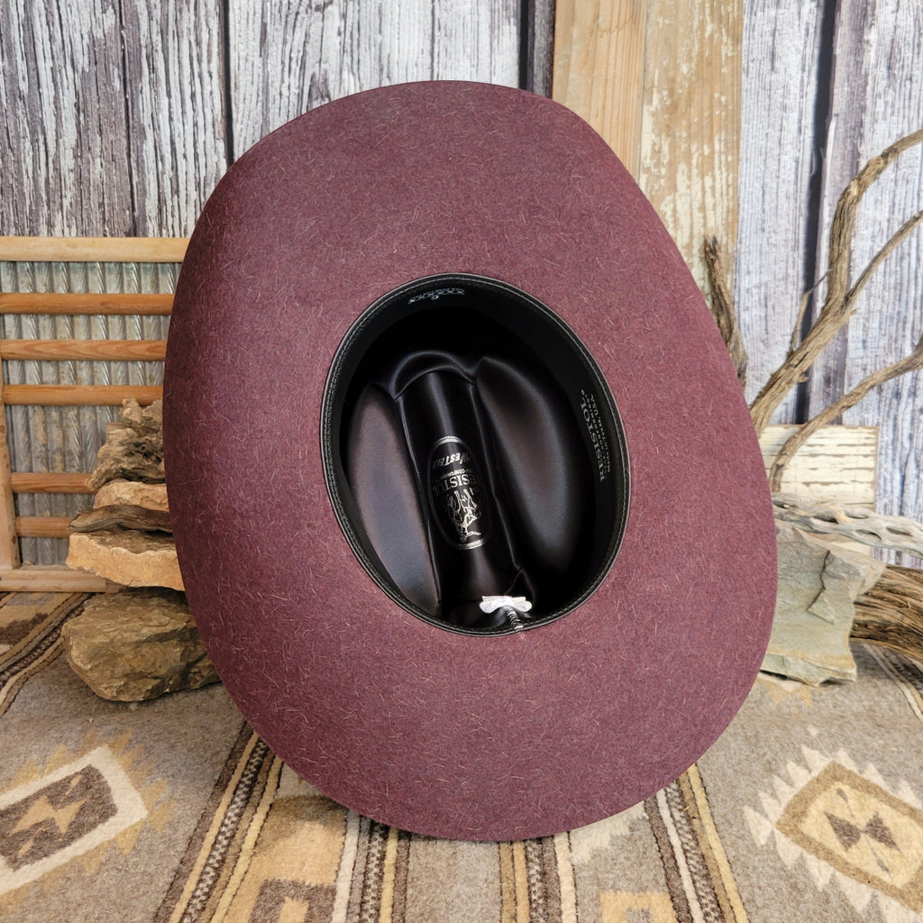 The interior of the hat is lined with information and logo.