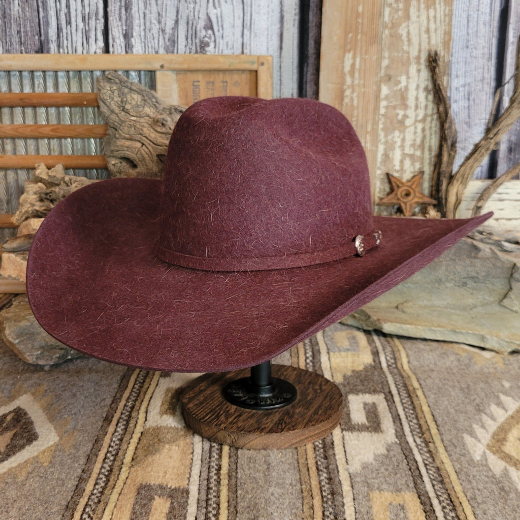 Burgundy 6X fur felt hat with a wide brim and cattleman's crease crown.