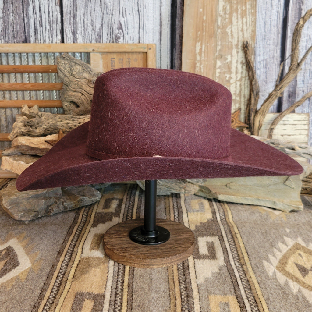Burgundy fur felt hat, displaying its wide brim and shape.
