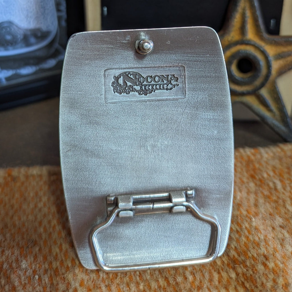 Smooth backing on the back of belt buckle.