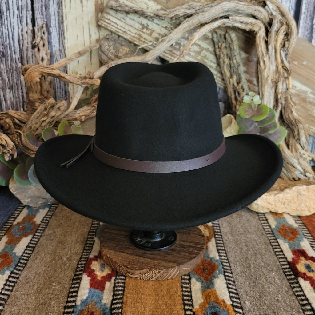 Black hat with a brown leather band.