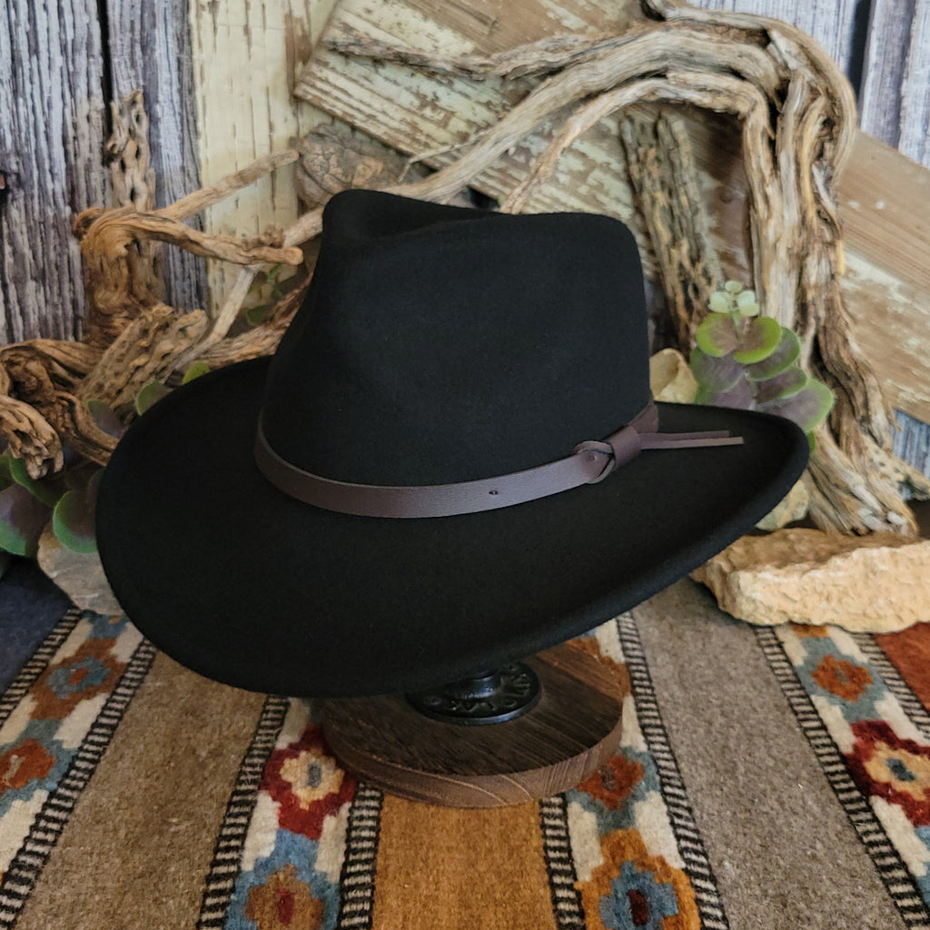 Black hat with a brown leather band.