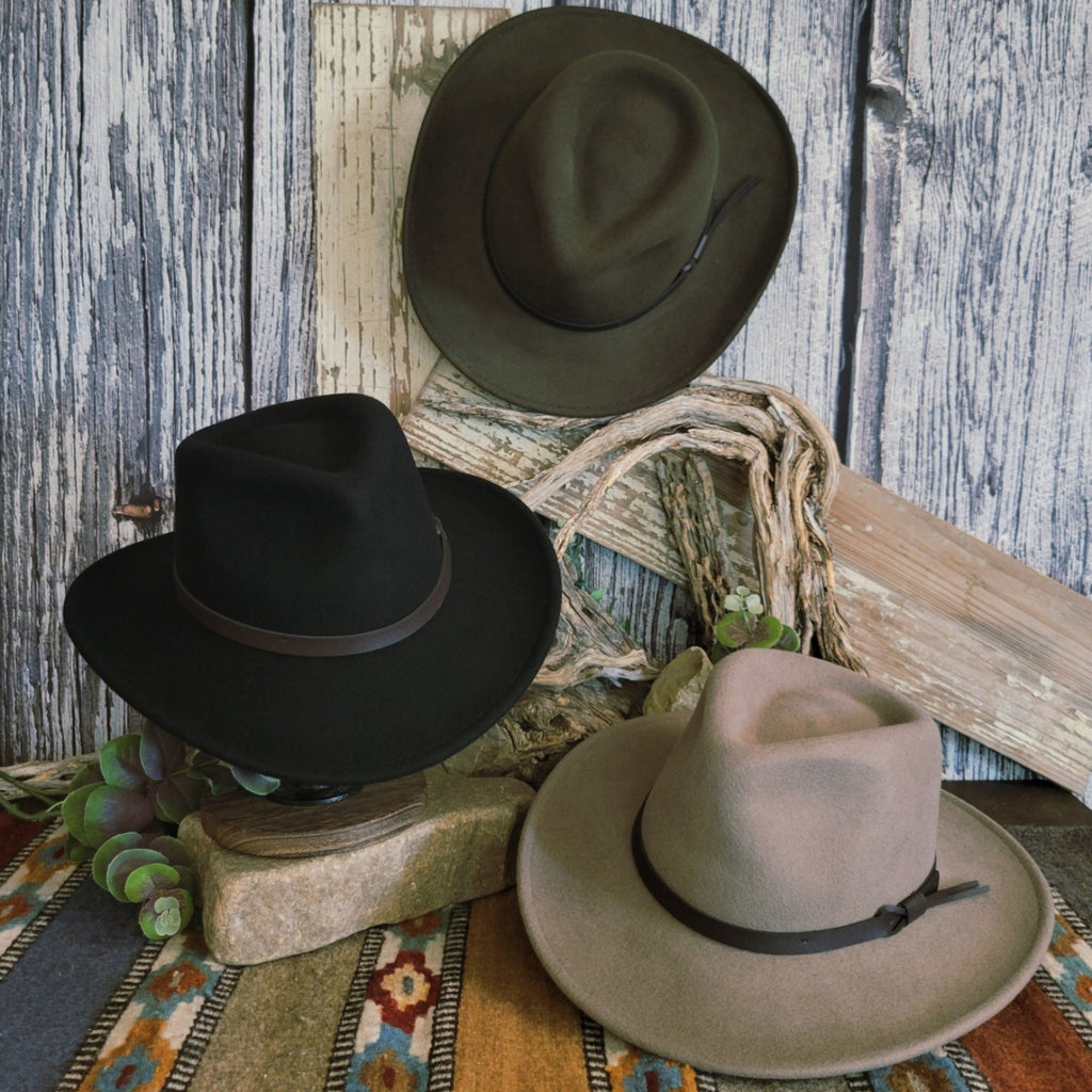 Three hats in the colors black, olive, or putty.