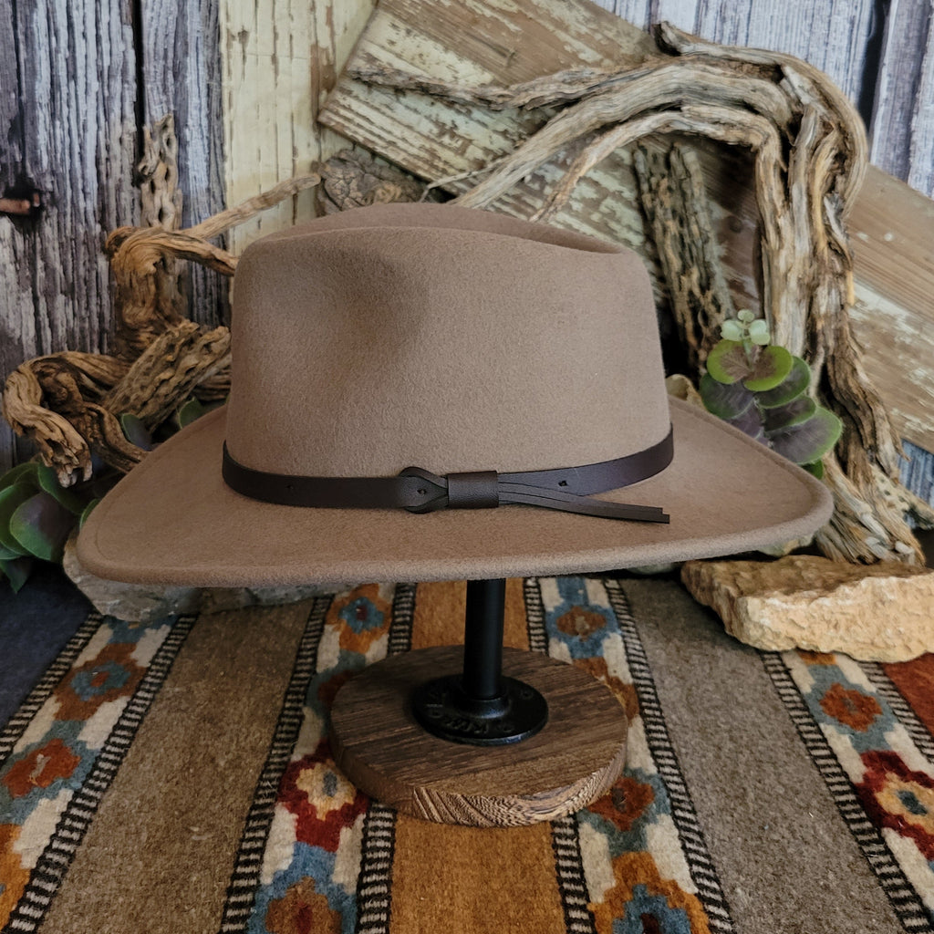 Putty colored hat with a black band.