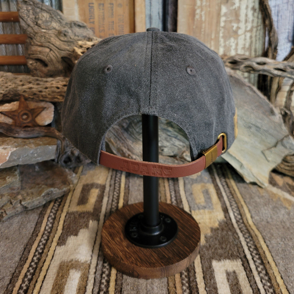 Adjustable snap back closure on the back of the cap.