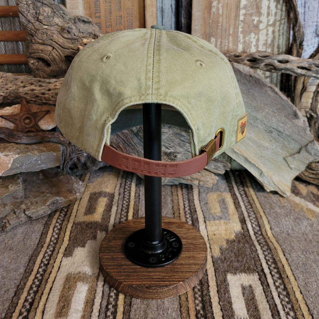 Adjustable snap back closure on the back of the cap.