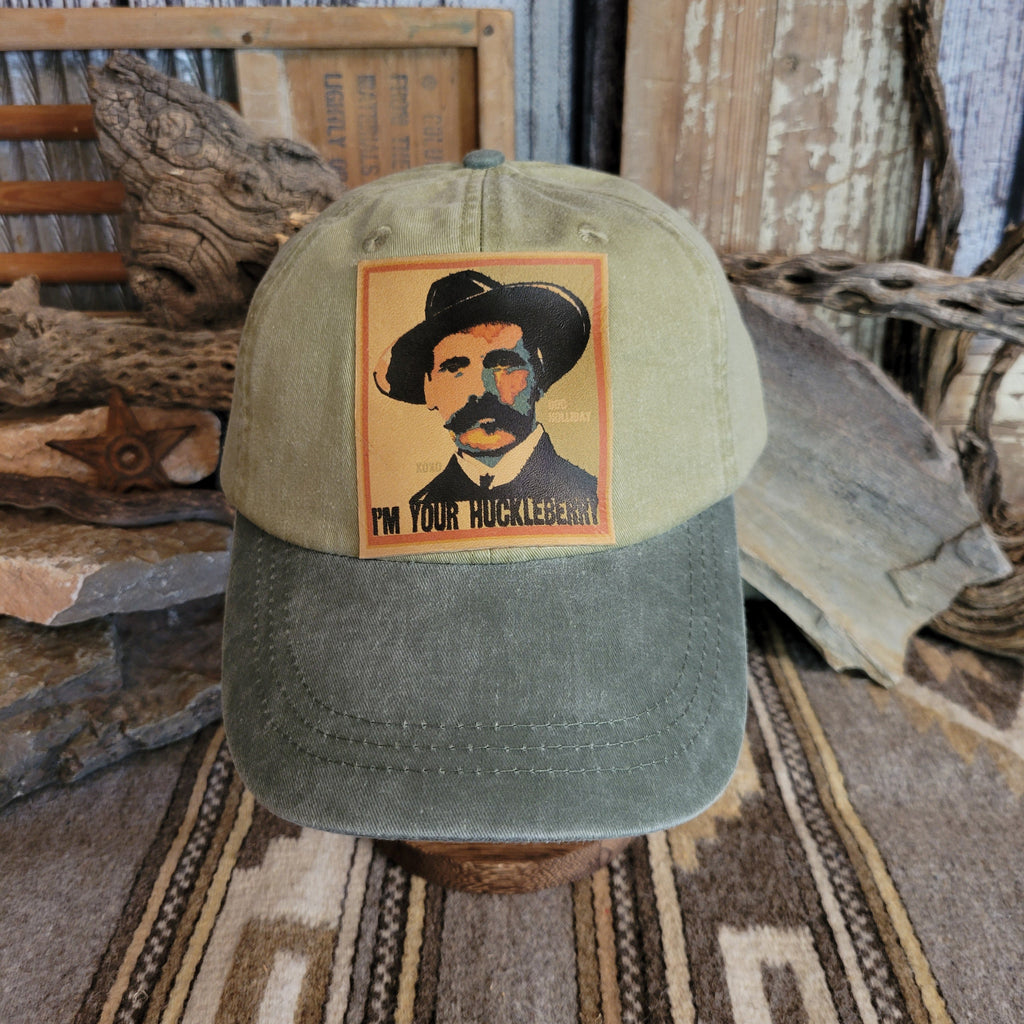 Spruce distressed baseball cap with a patch of Doc Holliday.