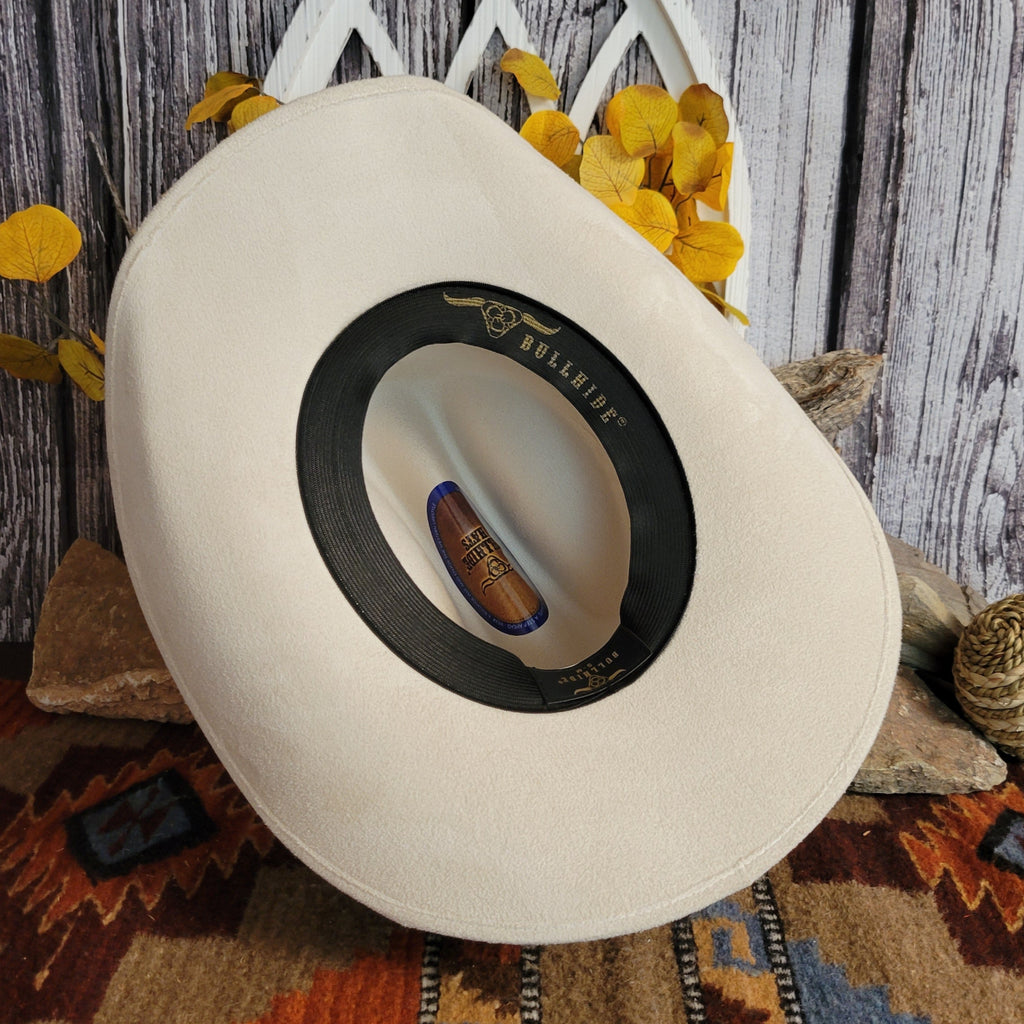 The interior features the black sweatband and brand's logo.