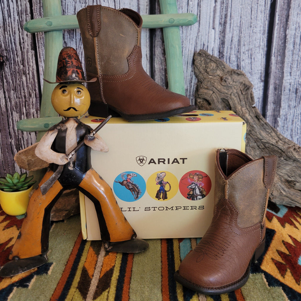 Tan leather booties with a two-tone finish and subtle stitched detailing along the shaft.