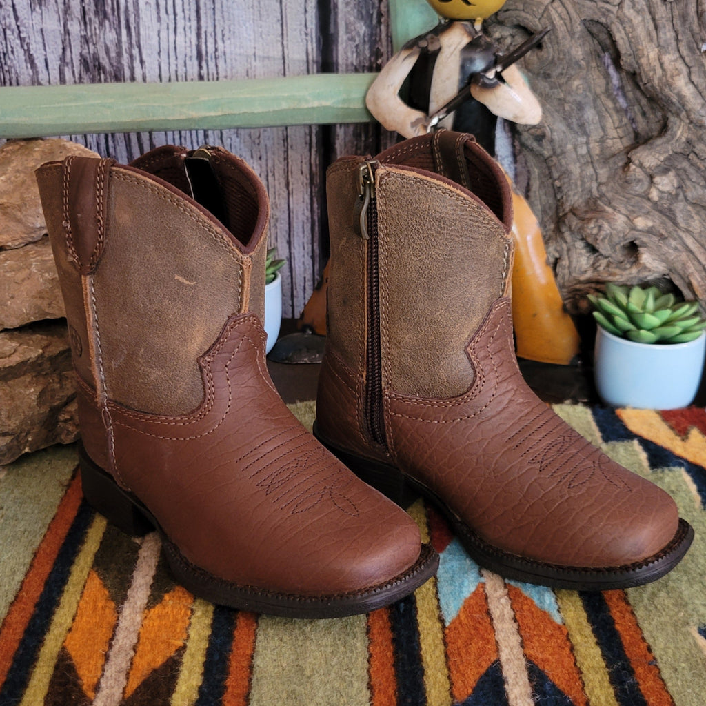 Tan leather booties with a two-tone finish and subtle stitched detailing along the shaft.
