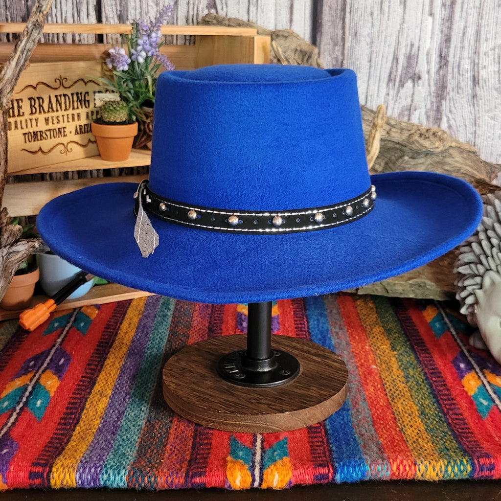 Blue wool felt hat featuring a black studded hat band.