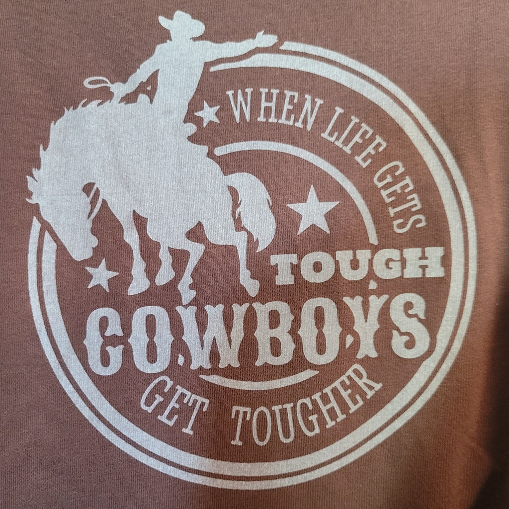 A detailed view of the slogan on the front of the shirt.