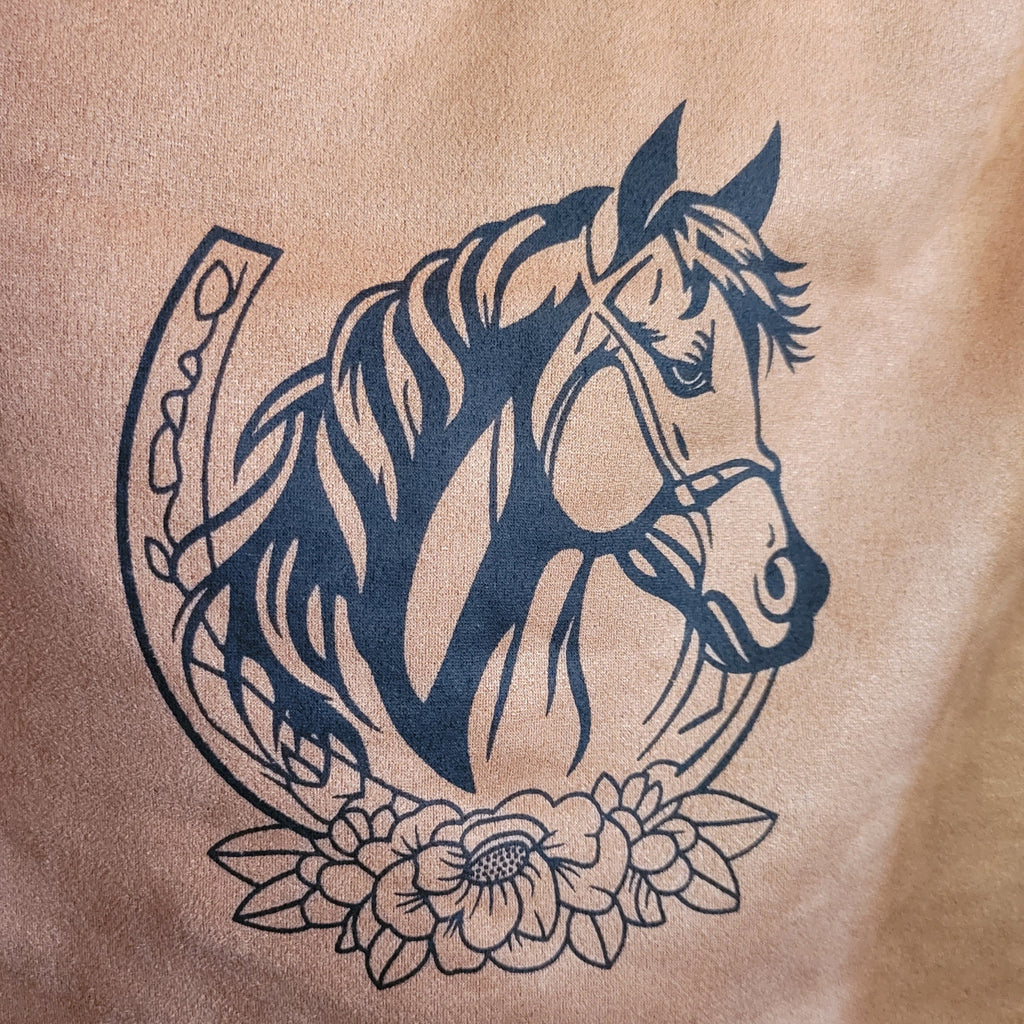 A close-up of the horseshoe design on the back.
