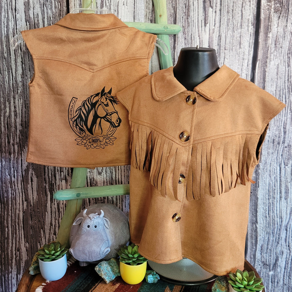 Suede vest with fringe on the front and horseshoe design on the back.