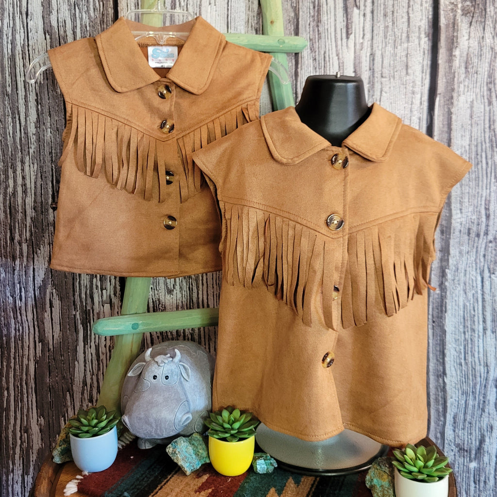 Suede vest with buttons and fringe on the front.