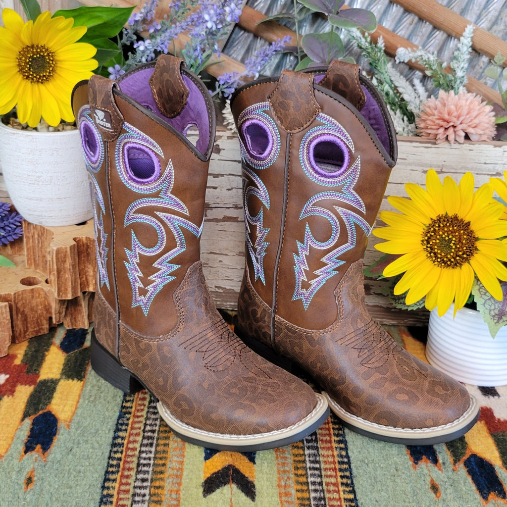 A brown faux-leather kids' boot with a leopard print pattern and purple stitched accents.