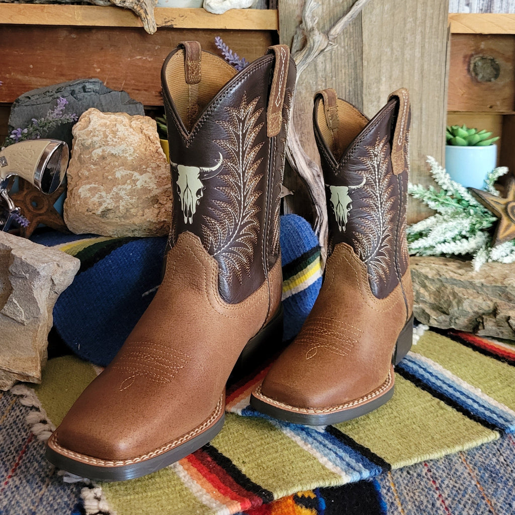 Youth and kids' cowboy boots made from leather with dark brown shaft featuring a cow skull detail.