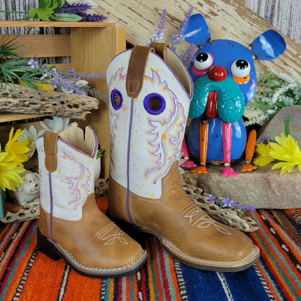 Kid's and infants leather boots side by side with tan leather and white with blue shaft.