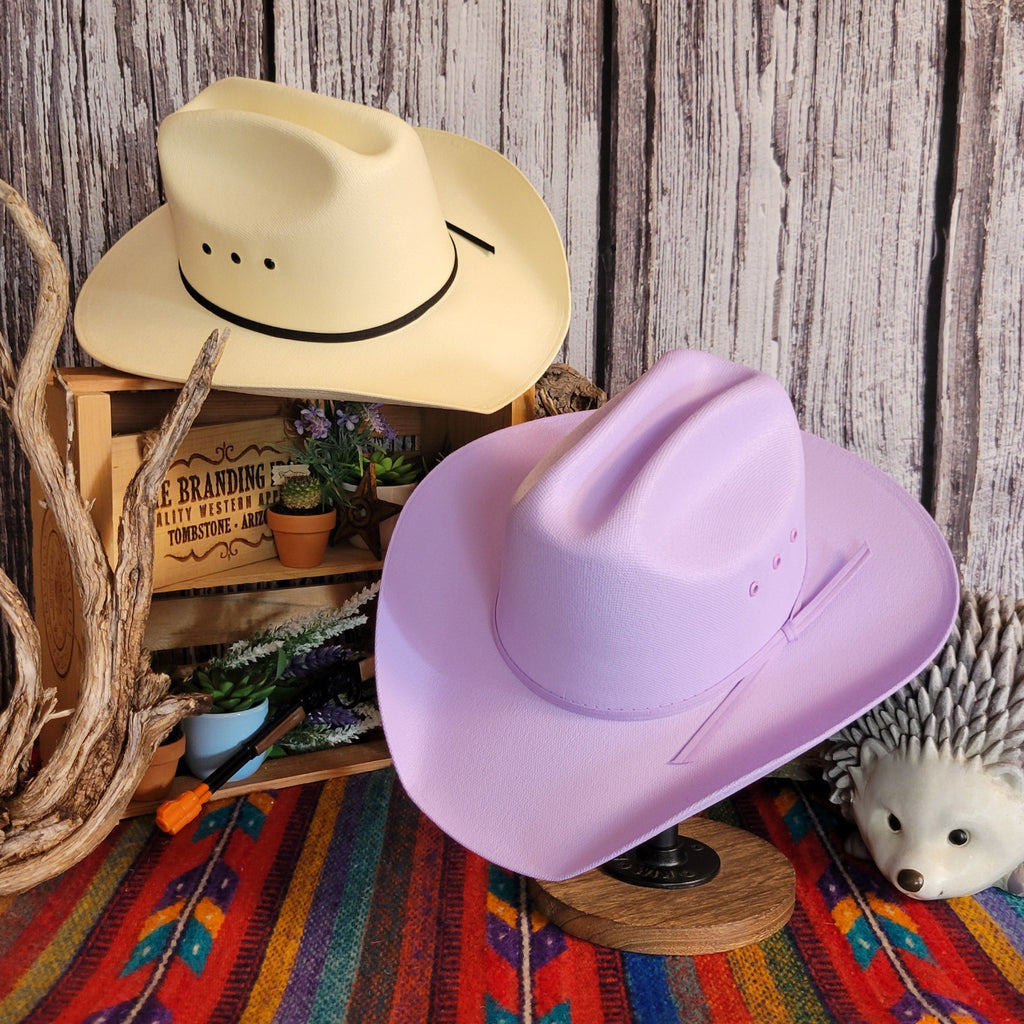 Purple and natural straw hats showcasing their colors.