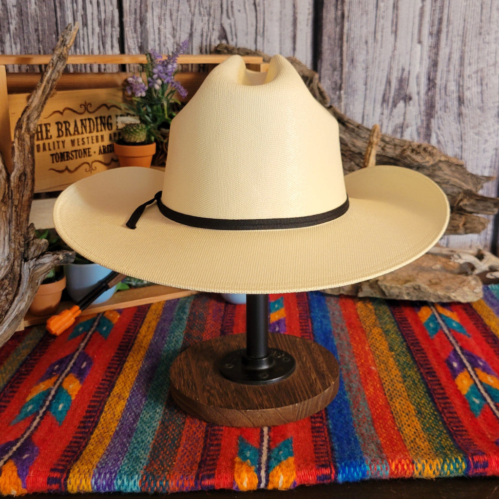 Straw hat with black hat band.