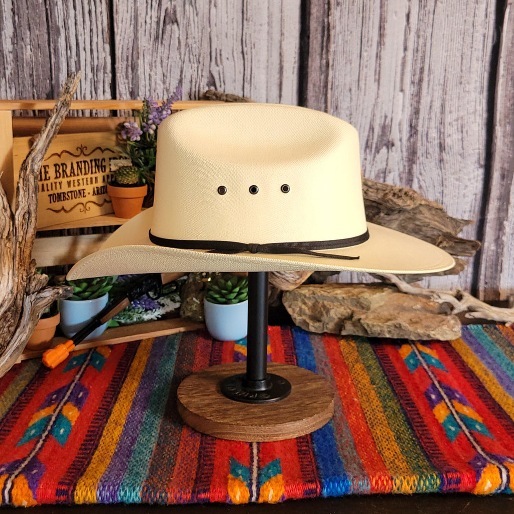 Straw hat with black hat band.