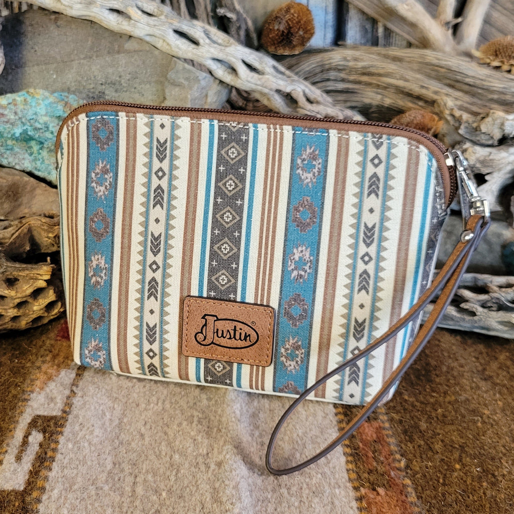 Canvas pouch with cowgirl design and southwestern print.