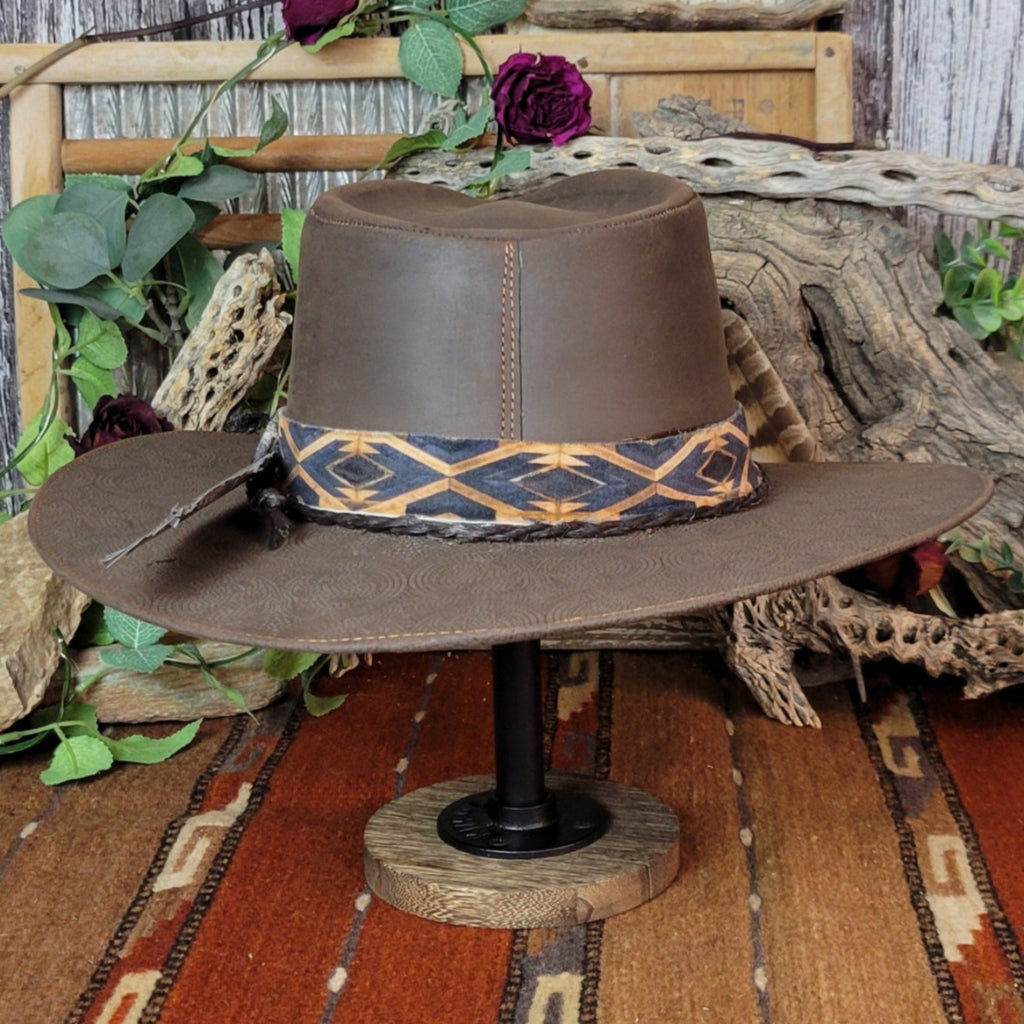 The back of the hat showcases it's diamond-patterned band with the braided cord.