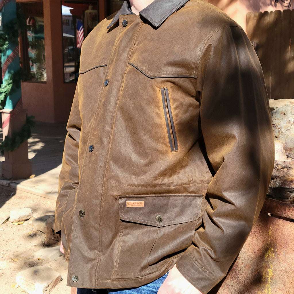 Brown conceal carry jacket with multiple pockets and conceal carry option.