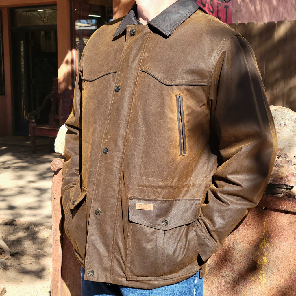 Brown conceal carry jacket with multiple pockets and conceal carry option.