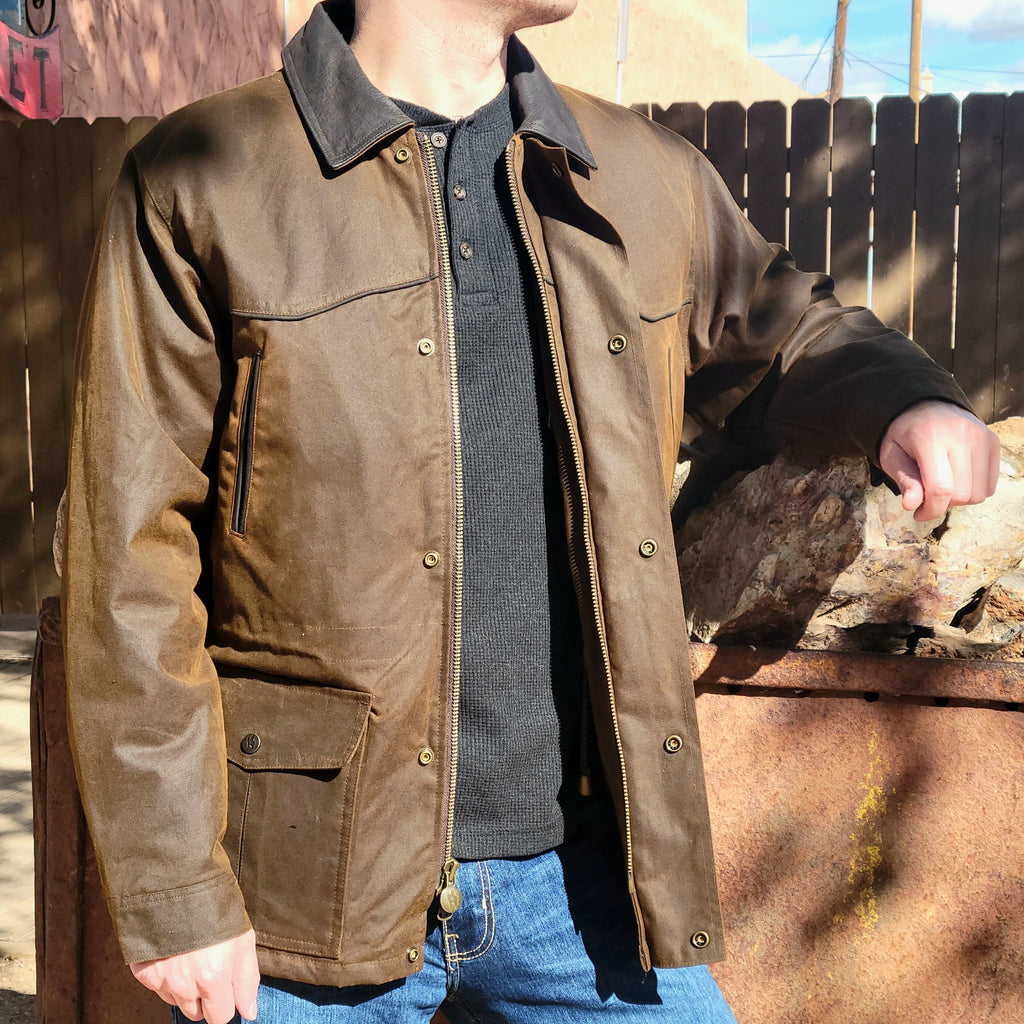 Brown conceal carry jacket with multiple pockets and conceal carry option.