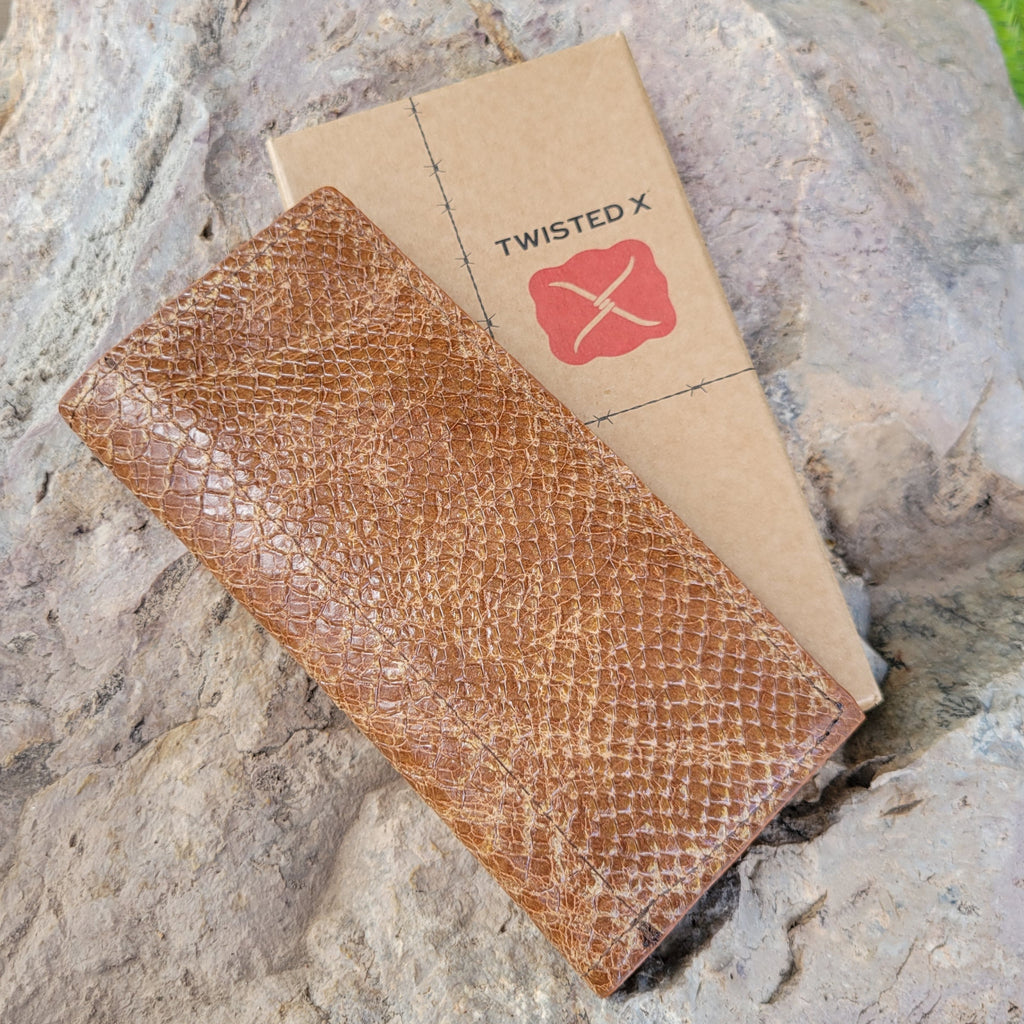 Tan leather rodeo wallet with replicated snake texture.