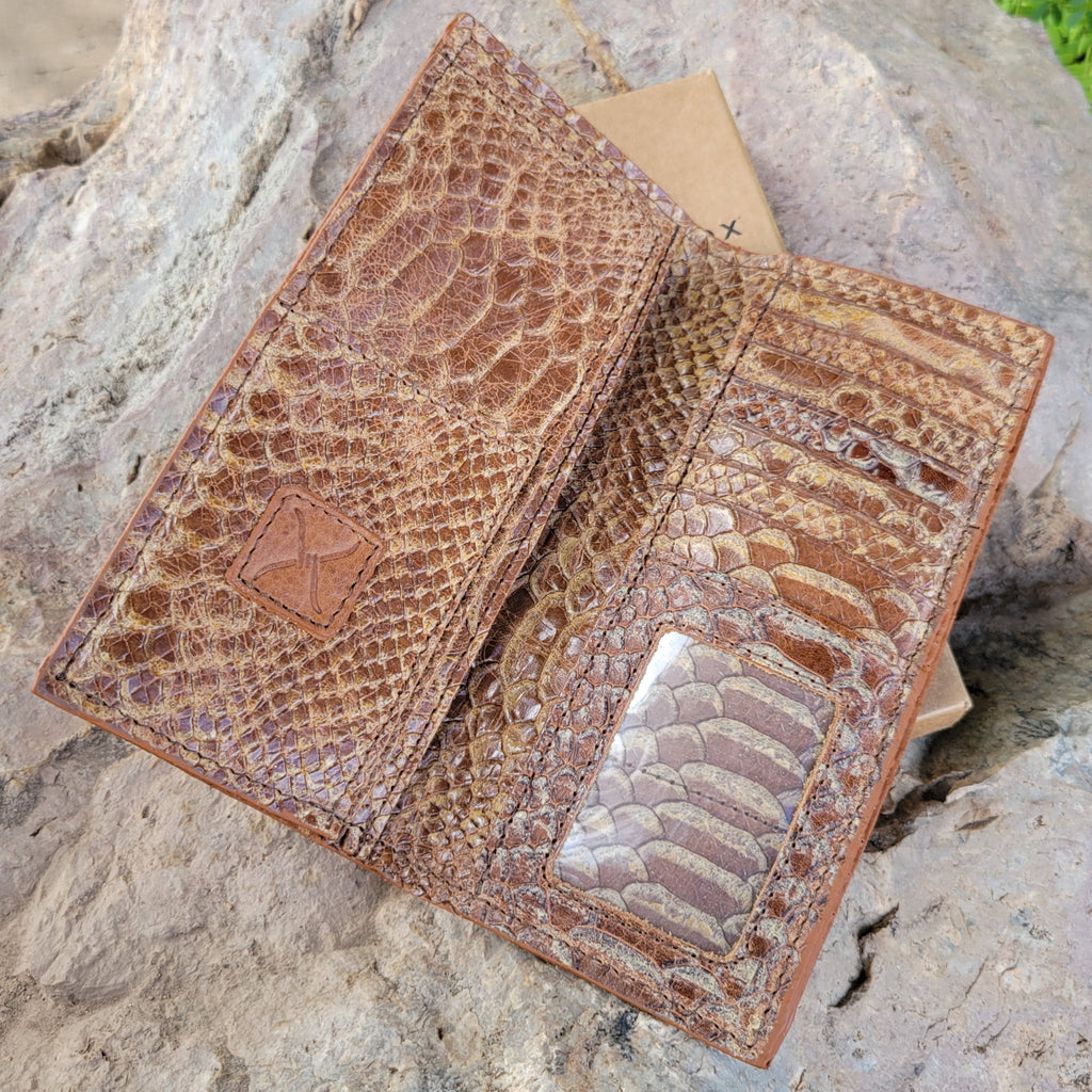 The interior features the multiple card slots and an ID slot with the replicated snake skin texture.