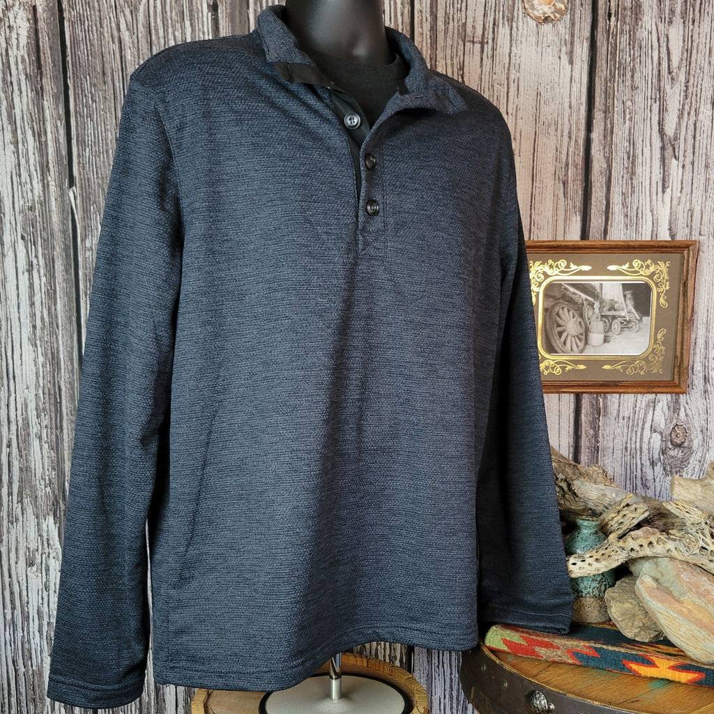 Dark blue sweater with half-button-up design and long sleeves.