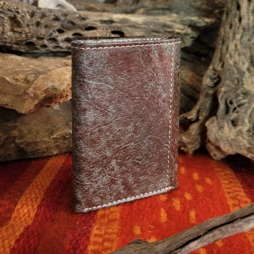 Weathered appearance on the back of the wallet.